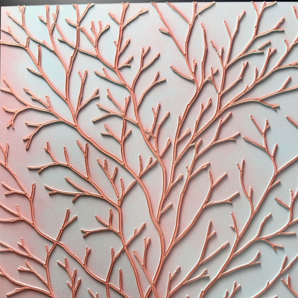 Unmodified photographic crop of the original physical Branch sample: coral-pink raised branches on pale gray-blue ground